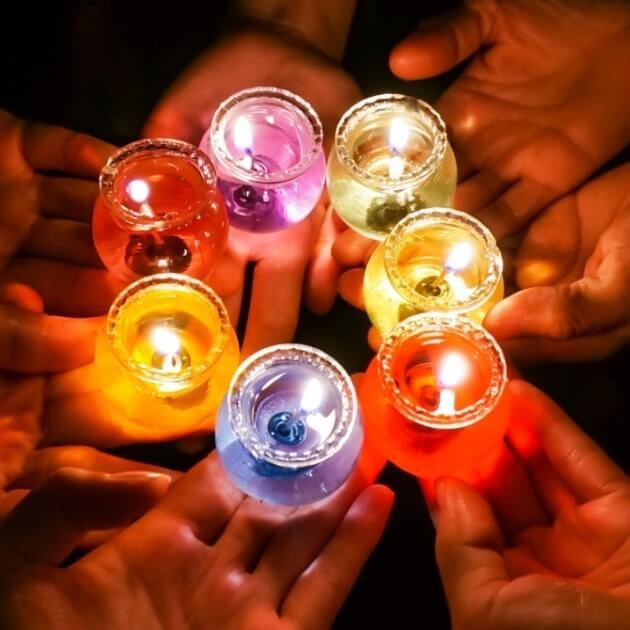 lights held by people. True Business Definitions for Entrepreneurs. Blazetrue article
