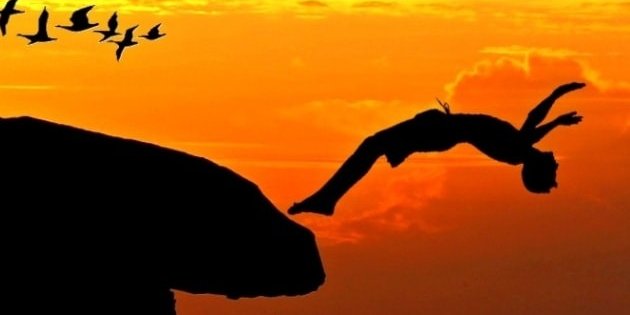 person diving off cliff. Why businesses fail. Blazetrue article